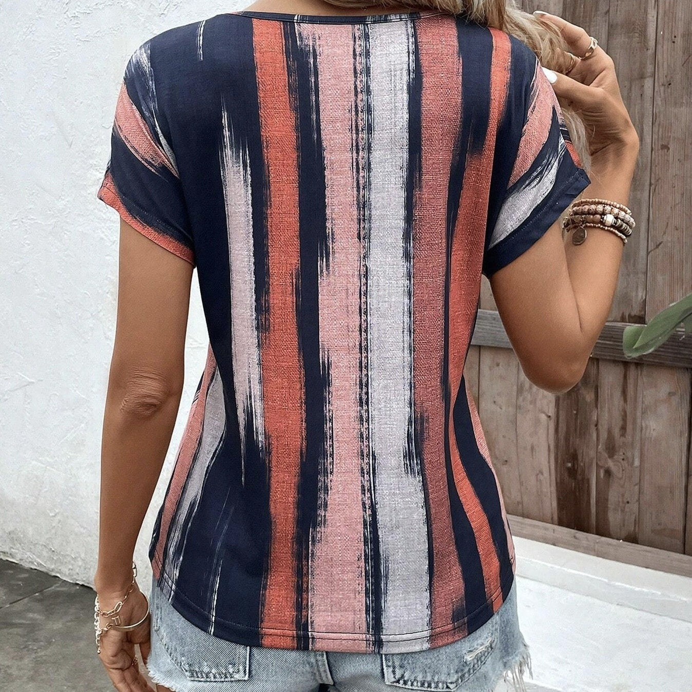 StrataFlow Batwing V-Neck Top