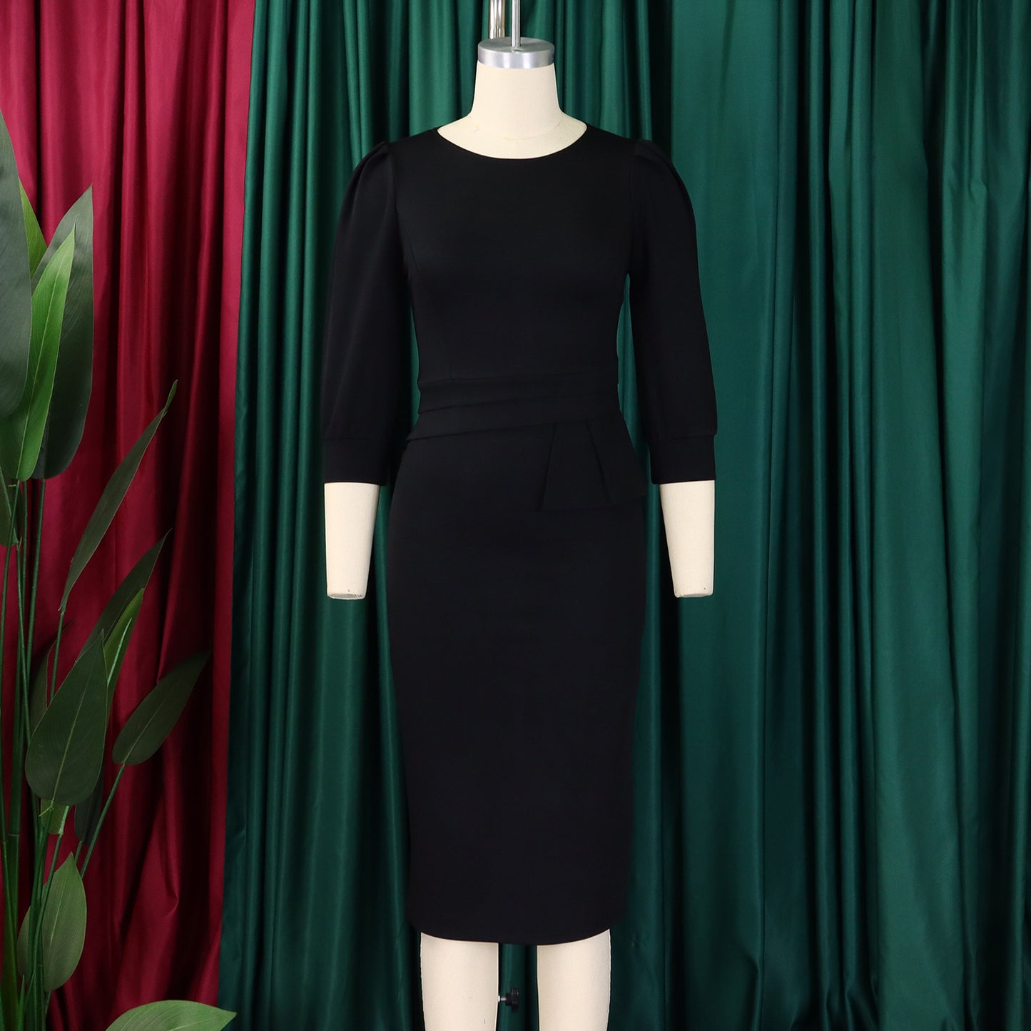 The PowerPoise Peplum Dress