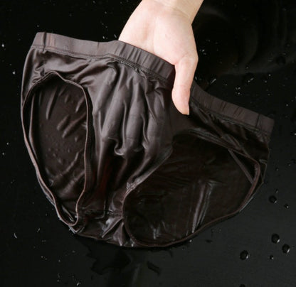 Simple Solid Color Men's Seamless Ice Silk Transparent Shorts