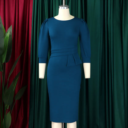 The PowerPoise Peplum Dress