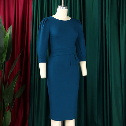 The PowerPoise Peplum Dress